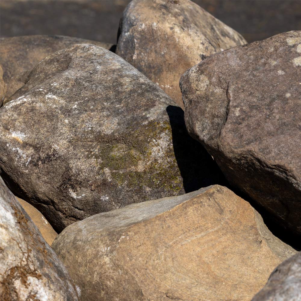 Close-up of large rocks with varying textures and colors for sale in jacksonville fl 