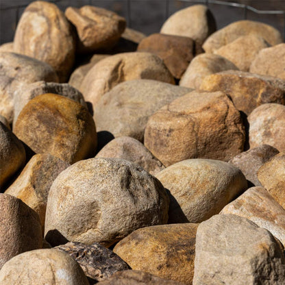 Close-up of a pile of brown and gray stones for sale in jacksonville fl